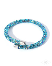Load image into Gallery viewer, Roll Out The Glitz - Blue coil bracelet PINK DIAMOND EXCLUSIVE UP