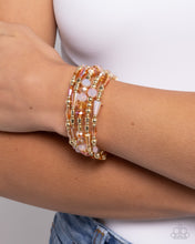 Load image into Gallery viewer, Seasoned Stack - Orange coil bracelet B099/43
