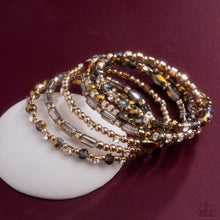 Load image into Gallery viewer, Timeless Tango - Gold coil bracelet SEPT 2025  LOP G031
