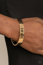 Load image into Gallery viewer, Hope Makes The World Go Round - Gold cuff bracelet B071
